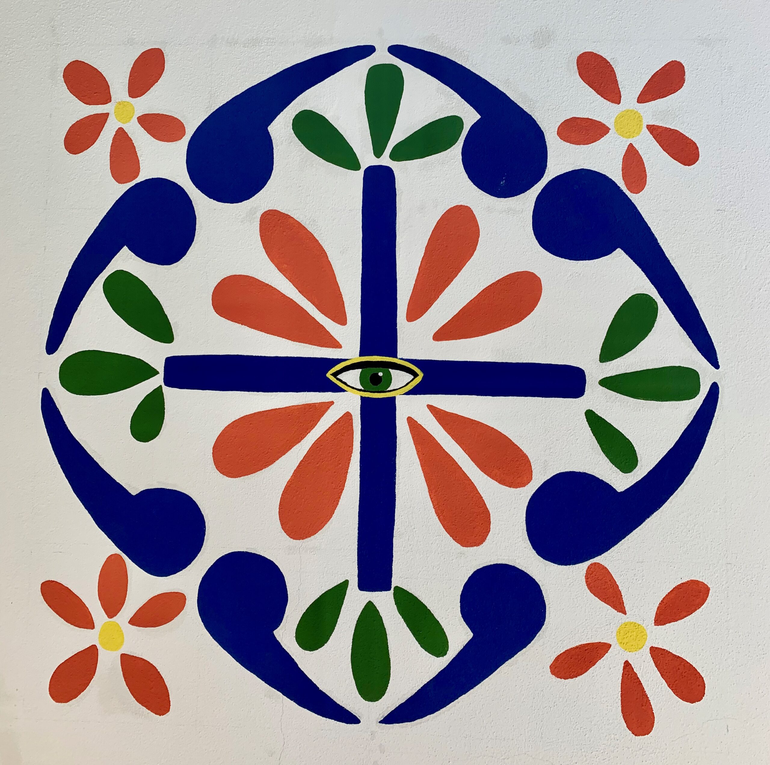 Image shows Mandela-type painting with flower, teardrop, and eye motif